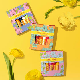 Burt's Bees tube in hand showing pocket readiness for on‑the‑go hydration benefit