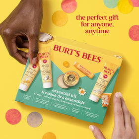 Burt's Bees five products arranged inside a travel pouch for on-the-go convenience
