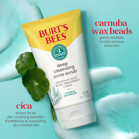 Burt's Bees 4 oz tube next to hand for size comparison and ease of use