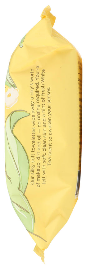 Burt's Bees pack beside a hand to show compact travel-friendly size