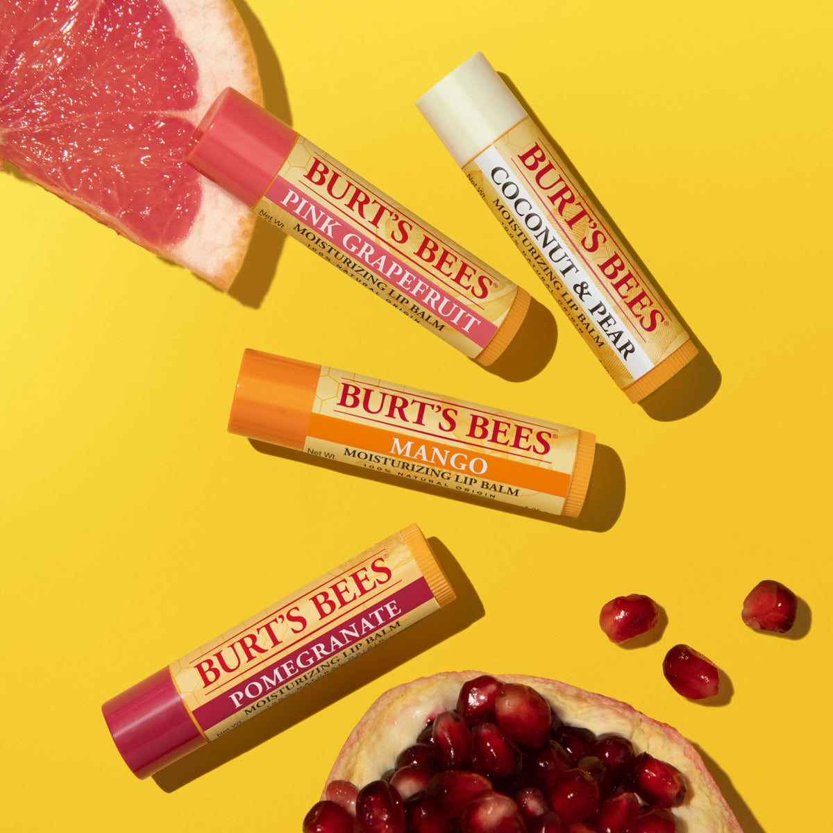 Burt's Bees tube next to a wallet showing pocket-sized convenience on the go