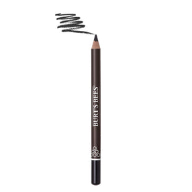 Burt's Bees eyeliner beside coin showing compact travel-friendly size