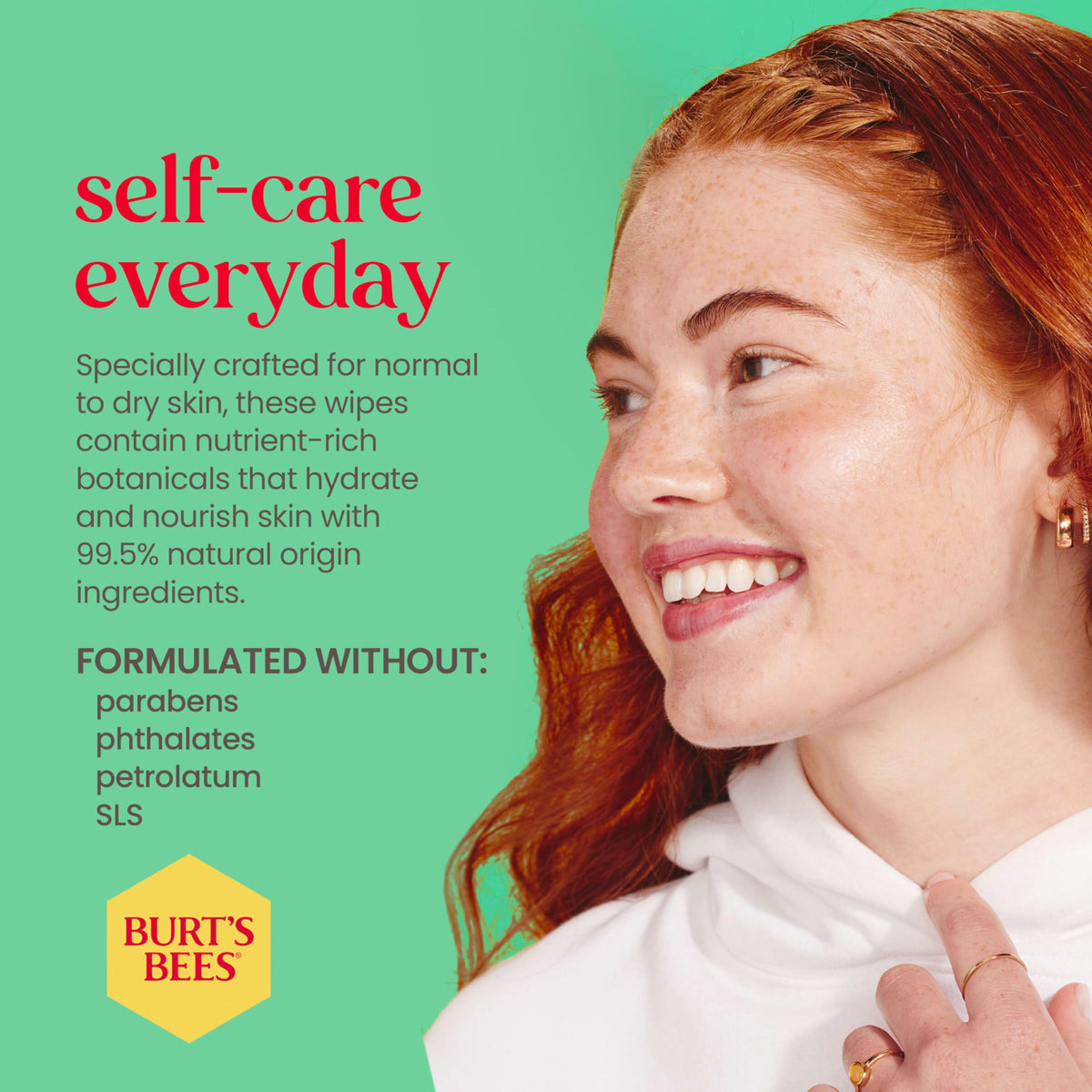 Burt's Bees wipe in hand removing makeup for convenient on-the-go cleansing
