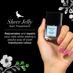 butter LONDON brush applying sheer plum layer for visible nail repair