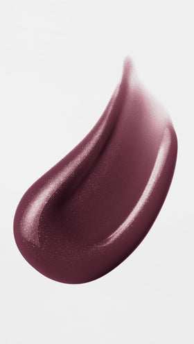 Buxom close-up of gloss texture highlighting non-sticky sheen