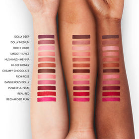 Buxom lifestyle image applying liner to lips for defined, fuller-looking pout