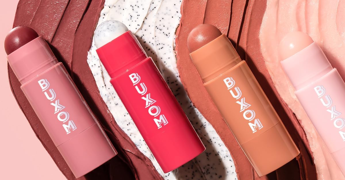 BUXOM First Crush held in hand highlighting compact size and travel-friendly benefit