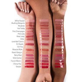 Buxom creamy gloss texture swatch on skin, shows smooth non-shimmery finish