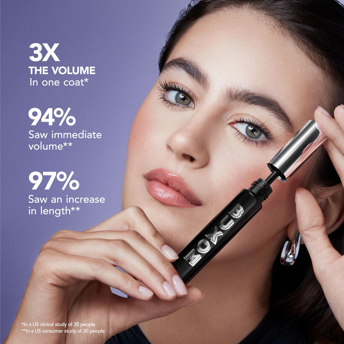 Buxom mascara wand texture with glossy pigment for rich black finish