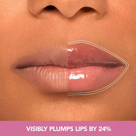 Buxom on model applying gloss for instant plump, dewy lifestyle look