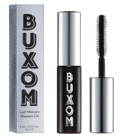 Buxom travel-size tube front showing compact packaging and bold black color