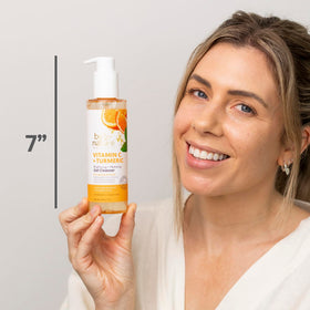 By Nature turmeric and vitamin C ingredients highlighting brightening support