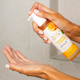 By Nature pump dispense closeup demonstrating easy one-handed use