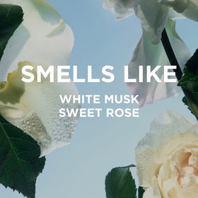 By Rosie Jane pumping body milk into hand demonstrating quick-absorbing application benefit