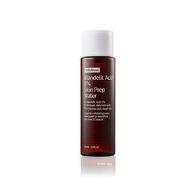 BY WISHTREND pouring toner onto cotton pad demonstrating easy application and prep benefits