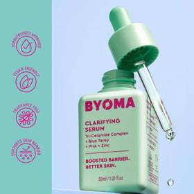 BYOMA blue tansy flowers beside bottle illustrating calming antioxidant