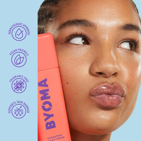 BYOMA hands applying milky toner to showcase easy absorption