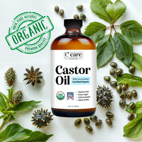 C CARE castor oil being massaged into scalp to hydrate and condition hair