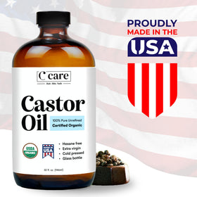 C CARE castor oil pouring to show thick golden texture for conditioning