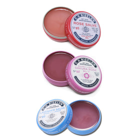 C. O. Bigelow front view of three salve tins showing scent variety and portability