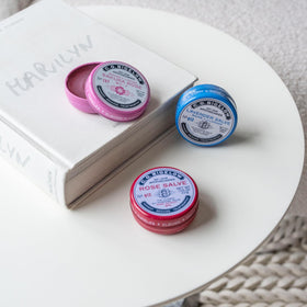 C. O. Bigelow travel pouch with tins illustrating portability and on-the-go relief