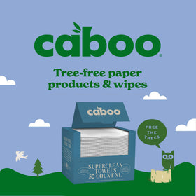 Caboo towel beside compost bin indicating biodegradable disposal