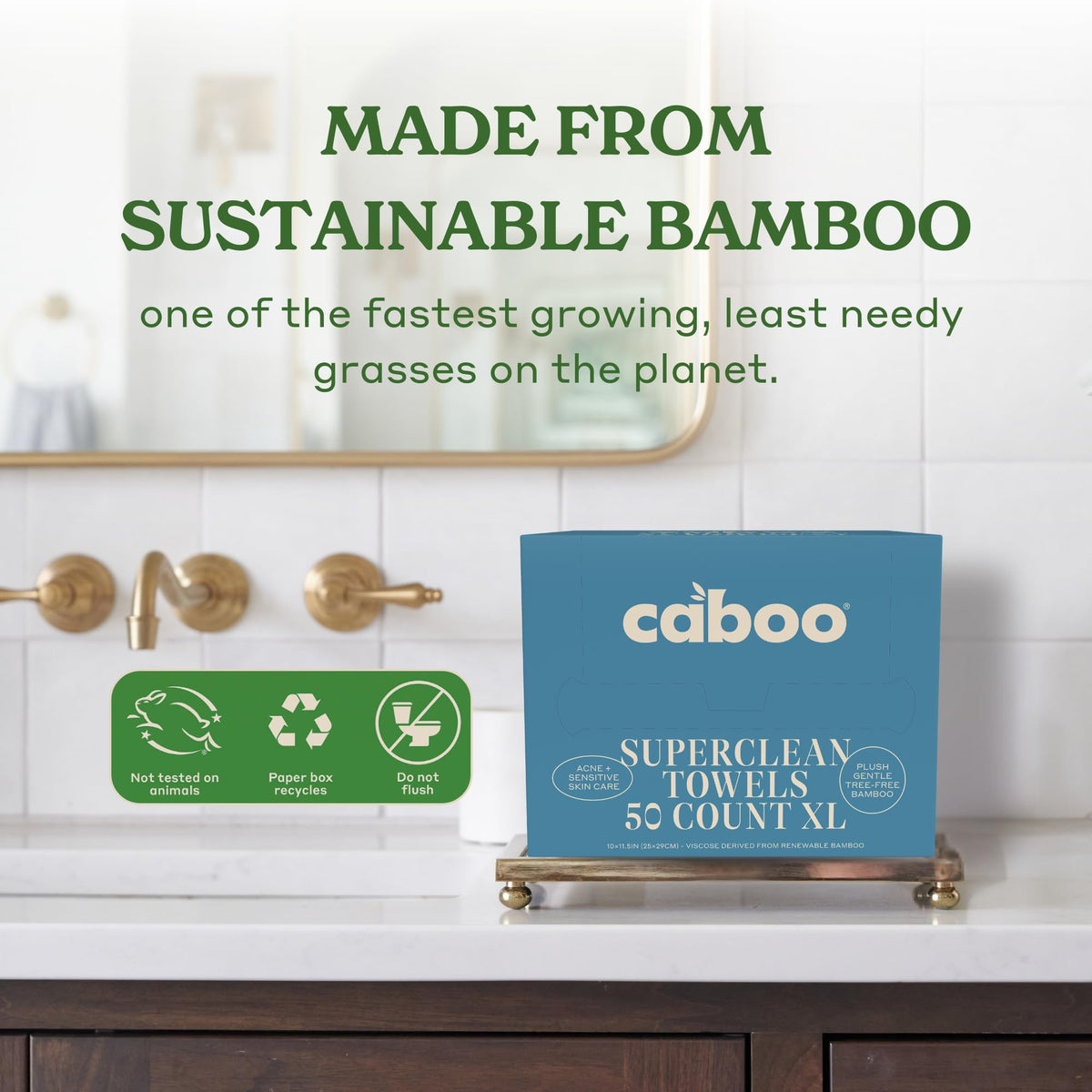 Caboo towel held in hand to show true 10x11.5 inch scale