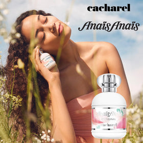 Cacharel bottle held in hand showing 1 fl. oz. scale and travel-ready convenience