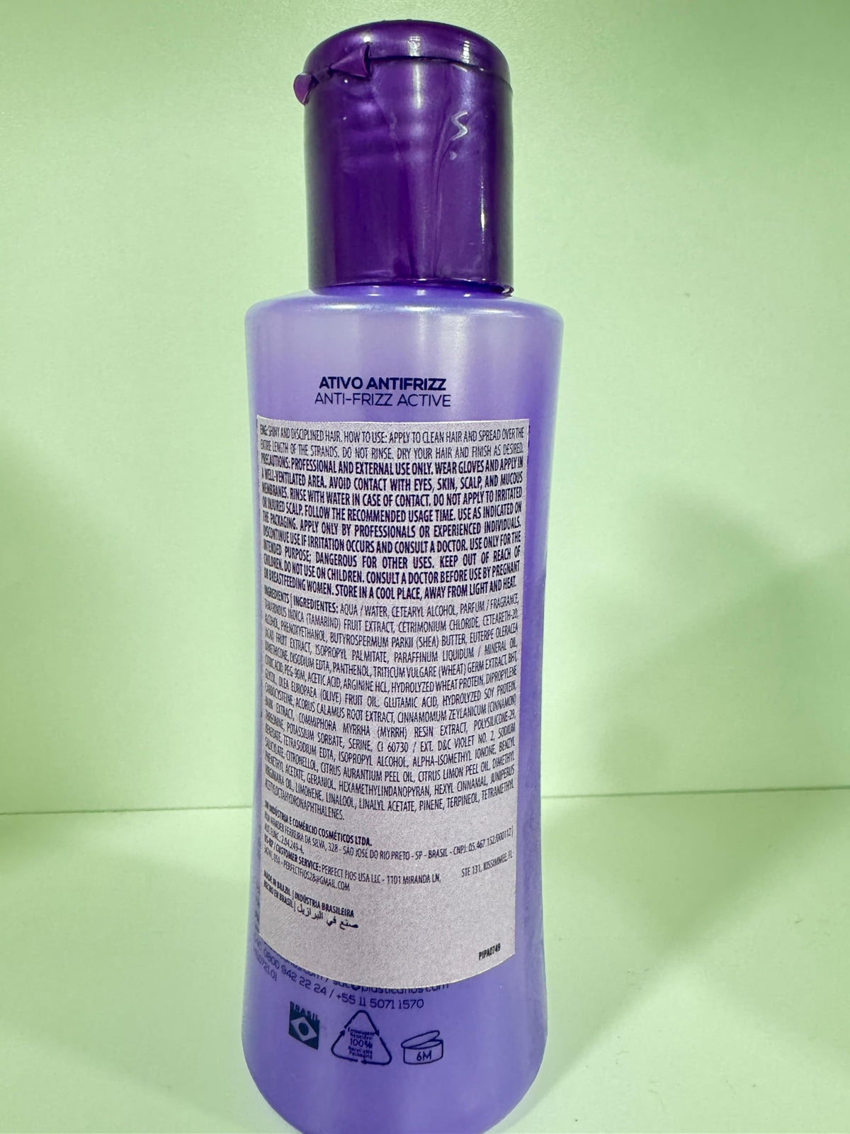 CADIVEU after treatment model with shiny, frizz-free hair benefit visible