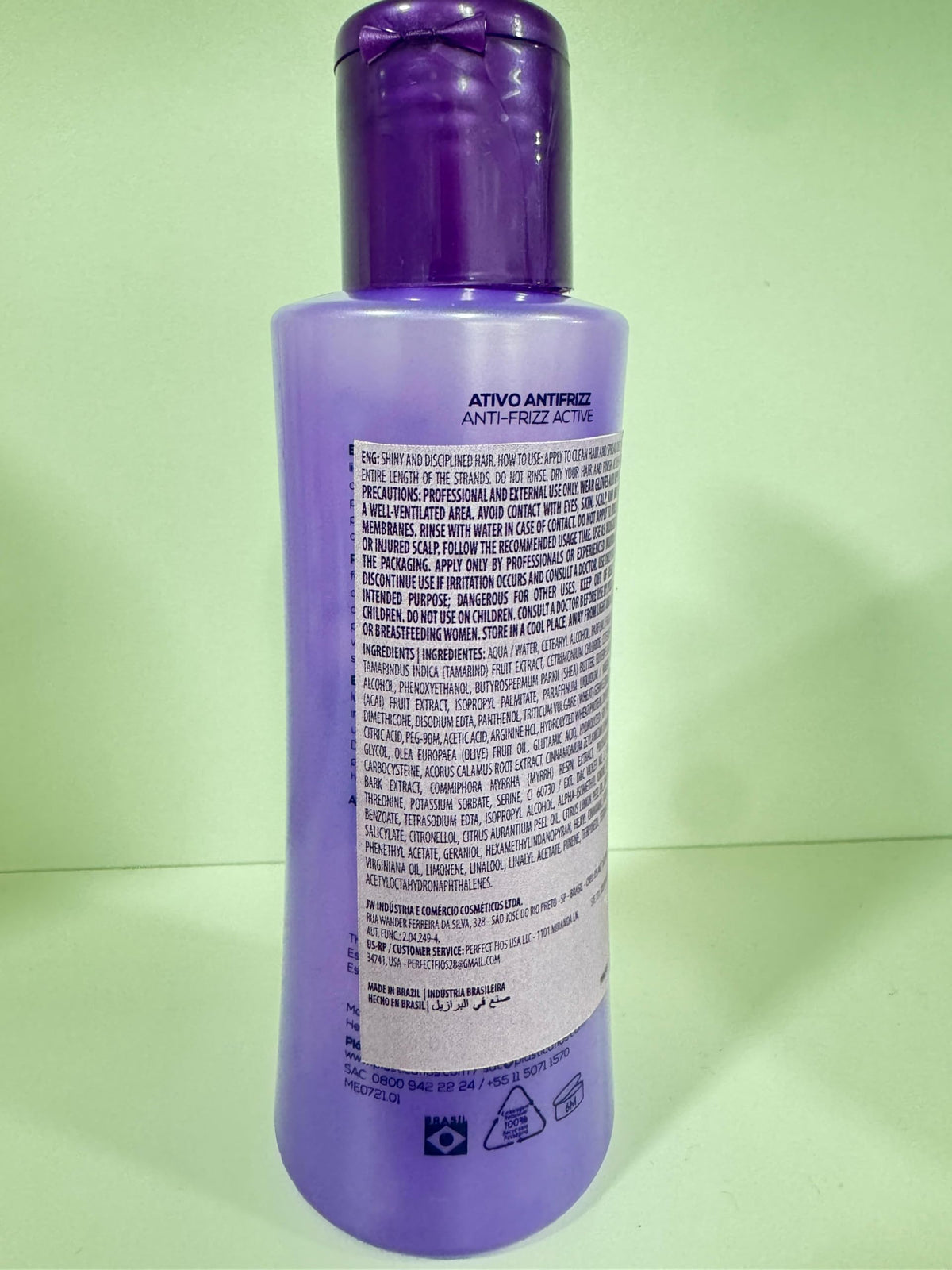 CADIVEU application brush applying keratin complex for controlled straightening