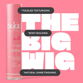 Cake Beauty applying spray under roots to show how to boost volume and lift