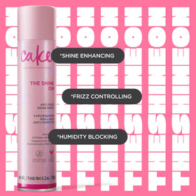 Cake Beauty bottle beside a hand for accurate size and scale