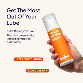 Cake bottle held in hand for size comparison highlighting convenient bedside storage