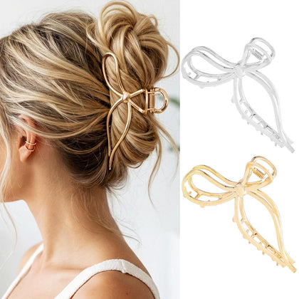 CAKURE gold bow clip front view showing elegant finish and secure hold
