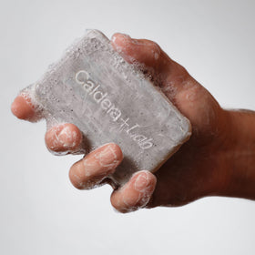 Caldera + Lab exfoliant texture close-up revealing gentle scrub particles