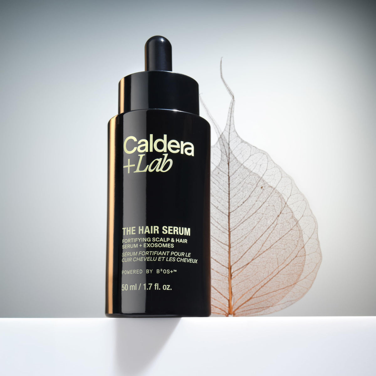 Caldera + Lab applied to scalp illustrating targeted delivery and easy massage-in