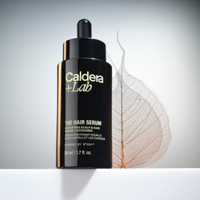 Caldera + Lab applied to scalp illustrating targeted delivery and easy massage-in