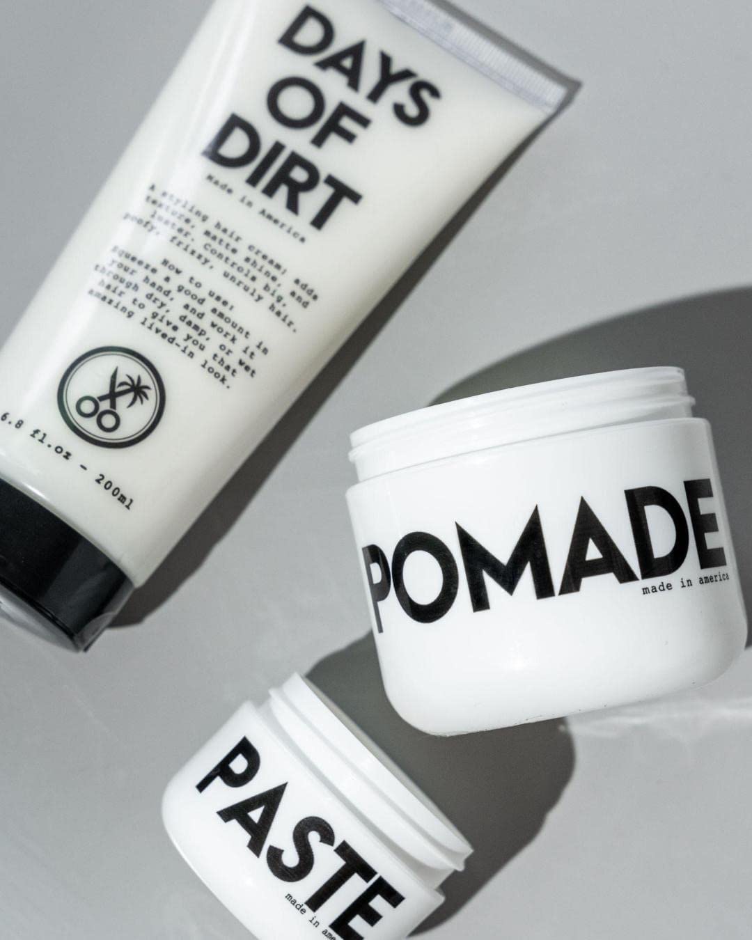 California Born tube next to passport for travel-friendly styling and on-the-go touch-ups