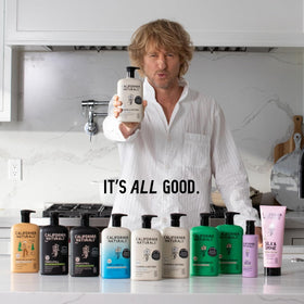 California Naturals Re:GRO set styled on bathroom shelf showing daily routine benefit
