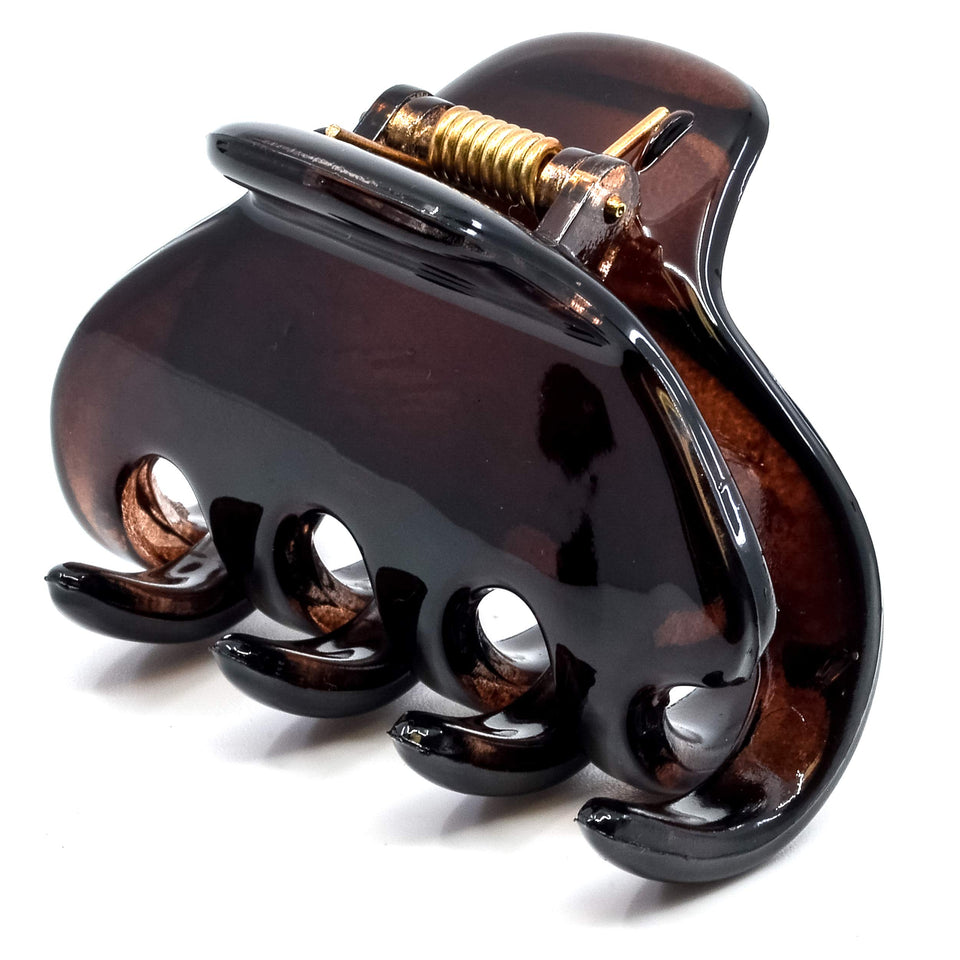 Camila front view showing compact tortoise finish and elegant design benefit