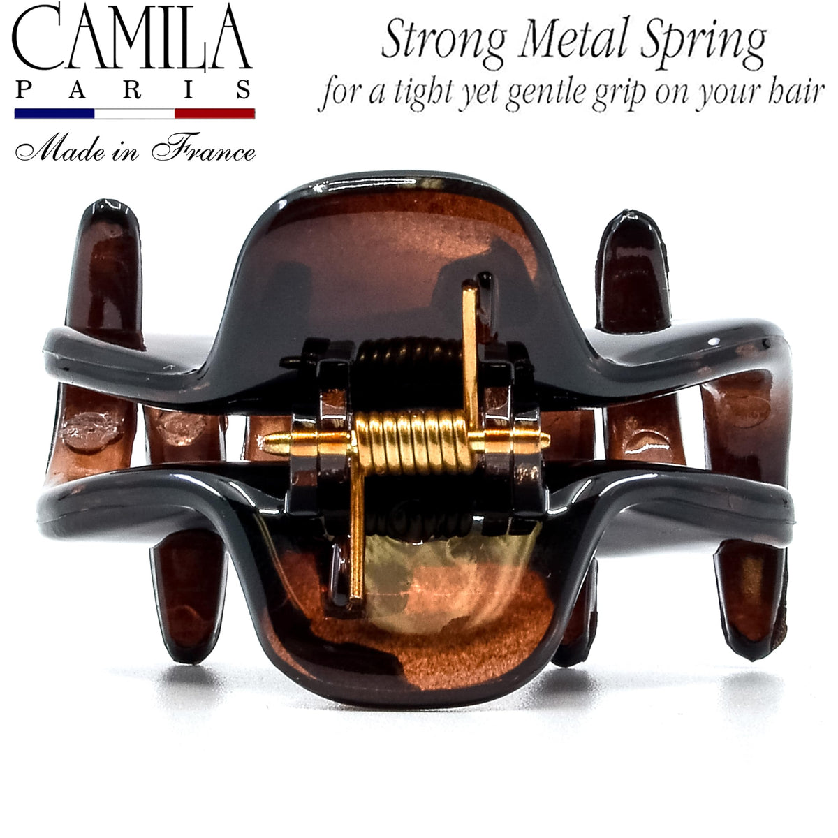 Camila securing a small bun to show styling versatility and no-slip hold benefit