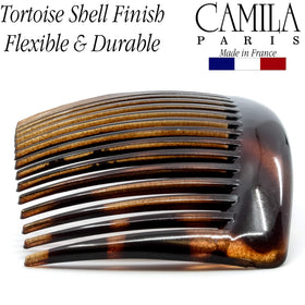 Camila Paris comb securing a low bun for reliable hold at events