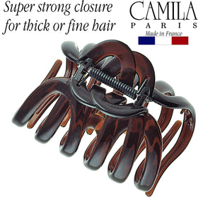 Camila Paris clip held in hand showing 3.5-inch size and fit