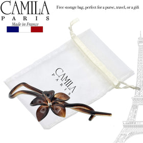 Camila Paris held in hand for size comparison and easy use