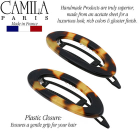Camila Paris held in hand to show compact 2-inch scale and grip