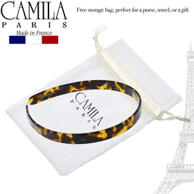 Camila Paris on curly hair demonstrating stable hold without tugging