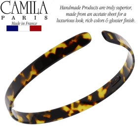 Camila Paris inner grip teeth visible offering non-slip hair support