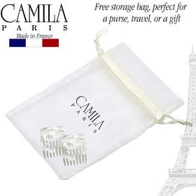 Camila Paris comb beside coin for scale showing compact 1.5 inch size