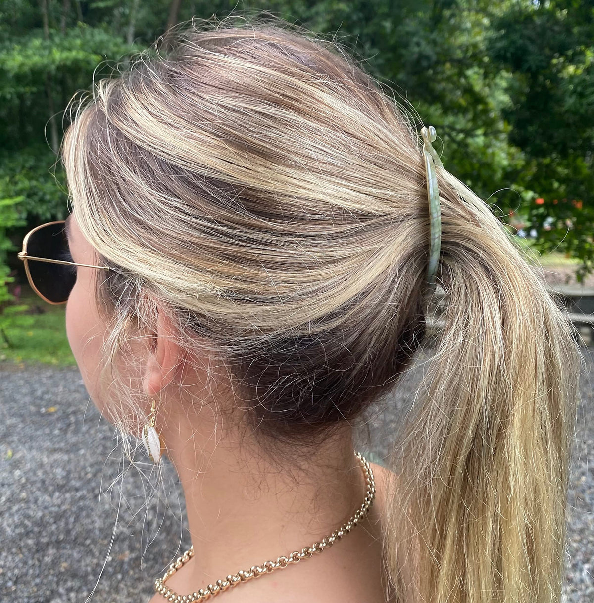 Camila Paris side profile emphasizing curved fishtail shape for comfortable contouring