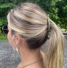 Camila Paris side profile emphasizing curved fishtail shape for comfortable contouring